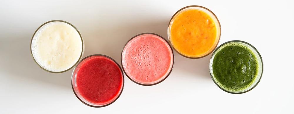 five different colorful smoothies